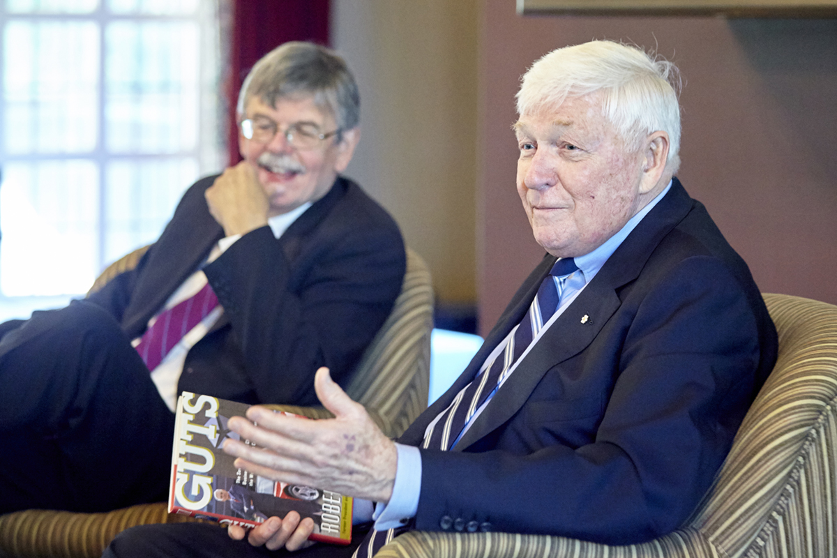 Red Wilson, Chancellor emeritus of McMaster University (right) chats with Gordon Pitts, Business Writer in Residence 