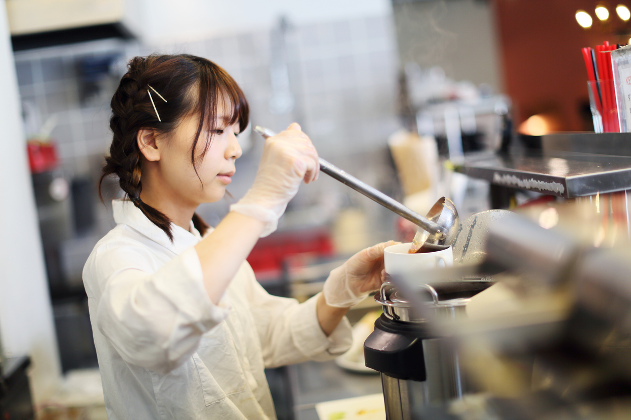 Student working in a cafe