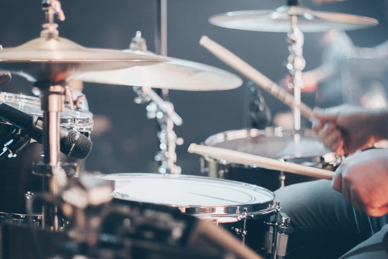 Drummer playing in band