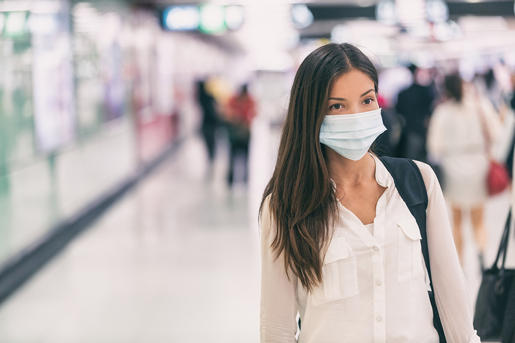 Woman wearing mask at airport