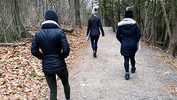 Rachel West walking in the forest