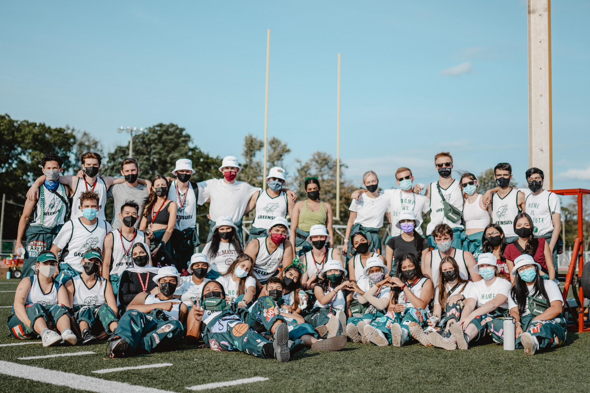 Photo of Greensuits on football field