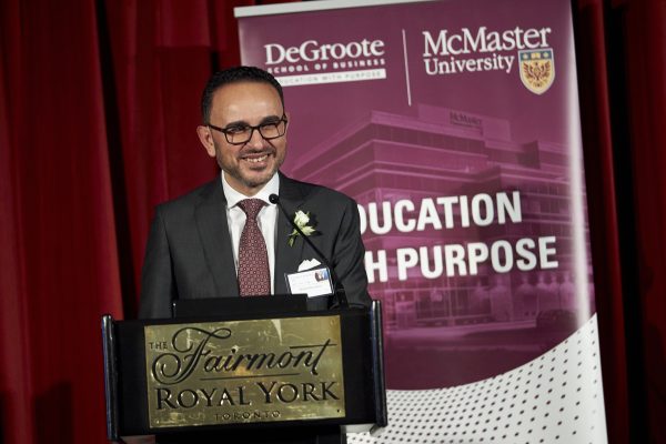 Image of Dr. Khaled Kassanein delivering remarks during the Accolades dinner