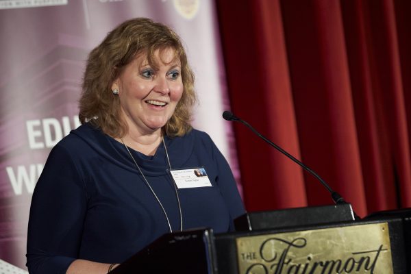 Image of Susan Tighe delivering remarks at the event