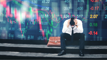 Tired or stressed businessman sitting on the walkway in panic digital stock market financial background