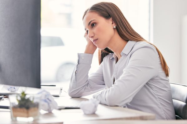 A woman "quietly quitting" at work