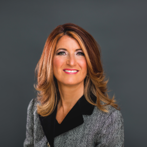 Portrait of Teresa Cascioli, recipient of the Order of Ontario, smiling.