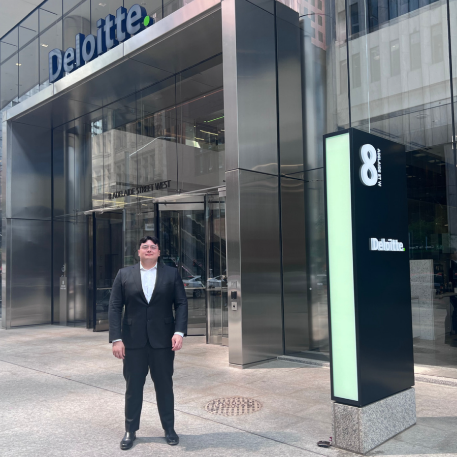 Standing outside the Deloitte office in Toronto.