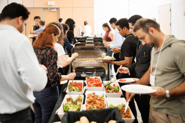 September 12, 2023; Hamilton, Ontario, Canada; DeGroote School of Business PhD Orientation and Welcome Lunch at CIBC Hall in the McMaster University Student Centre at McMaster University. Photo by Ron Scheffler for McMaster University.