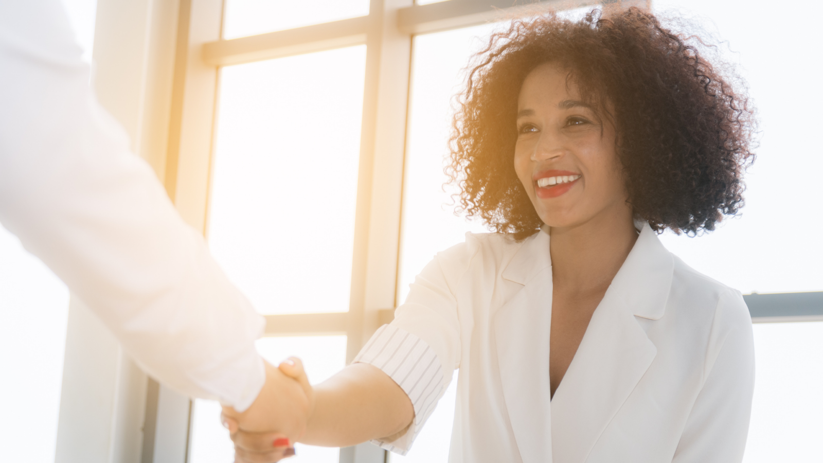 woman shaking hands